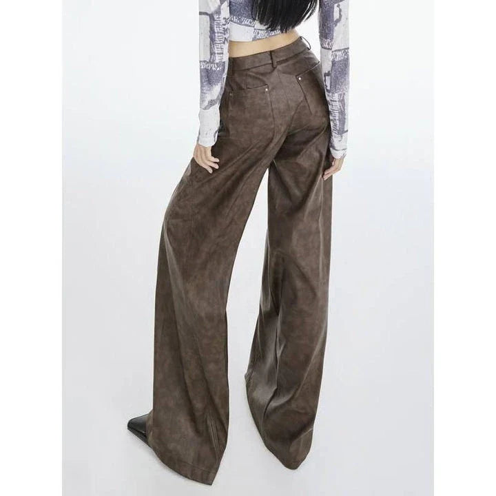 Faux leather wide leg trousers for middle-aged women, featuring a high-waist design and button-fly closure for a flattering fit.