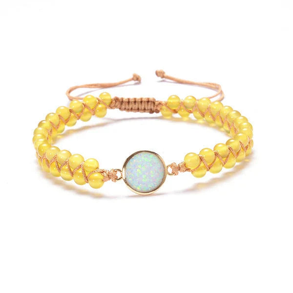 Stylish stone-wrapped bracelets featuring genuine amethyst and opal accents in a braided design