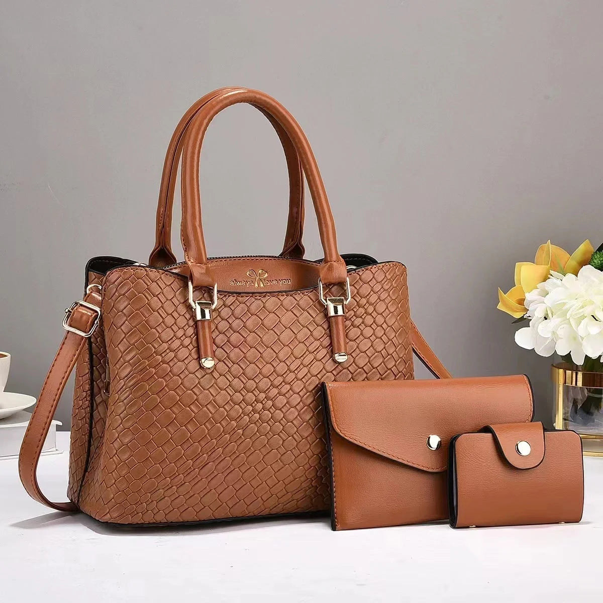 Retro woven three-piece shoulder bag set in various colours, showcasing large capacity and stylish design.