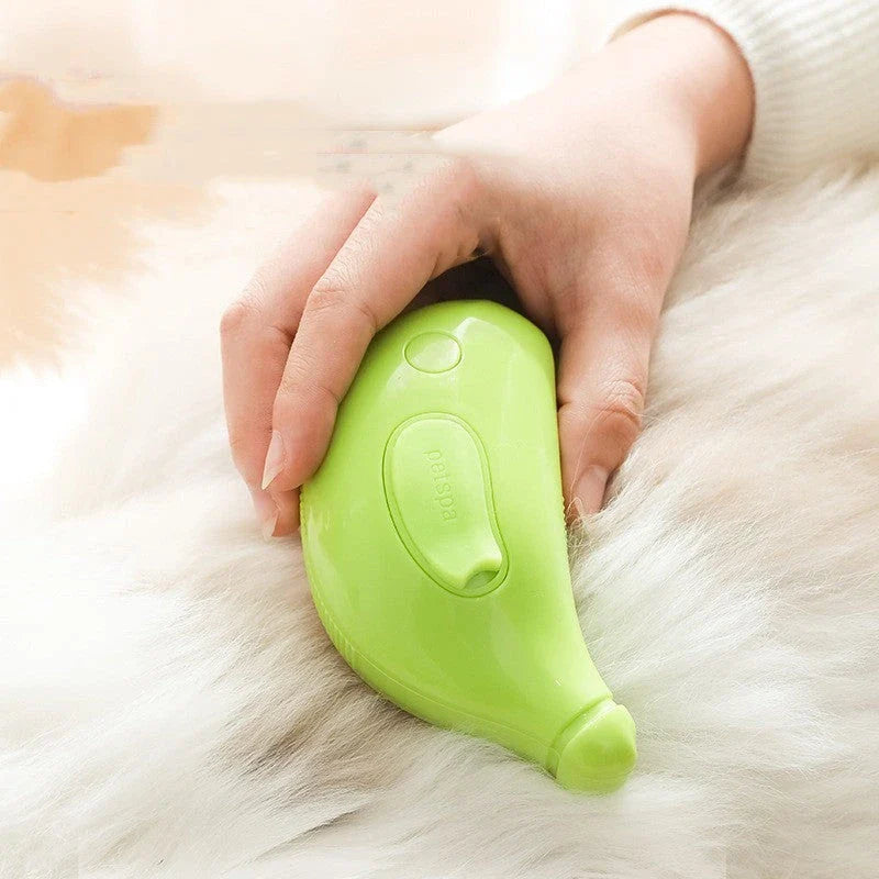 A versatile 3-in-1 pet grooming brush with steamy massage and hair removal features, perfect for cats and dogs.