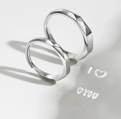 Elegant S925 sterling silver rings with a hidden love pattern design, adjustable sizing for a personalized fit.