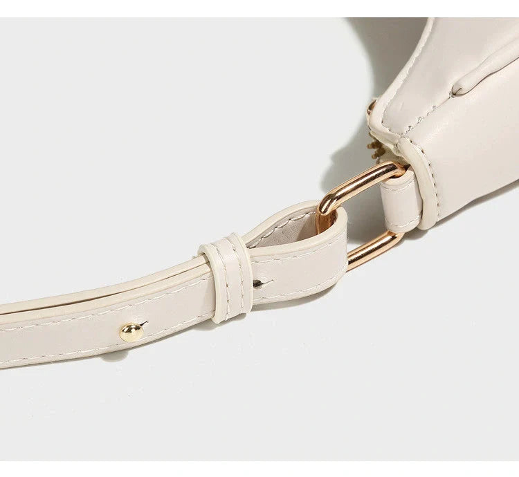 Stylish women's crossbody dumpling bag in soft PU with a crescent shape