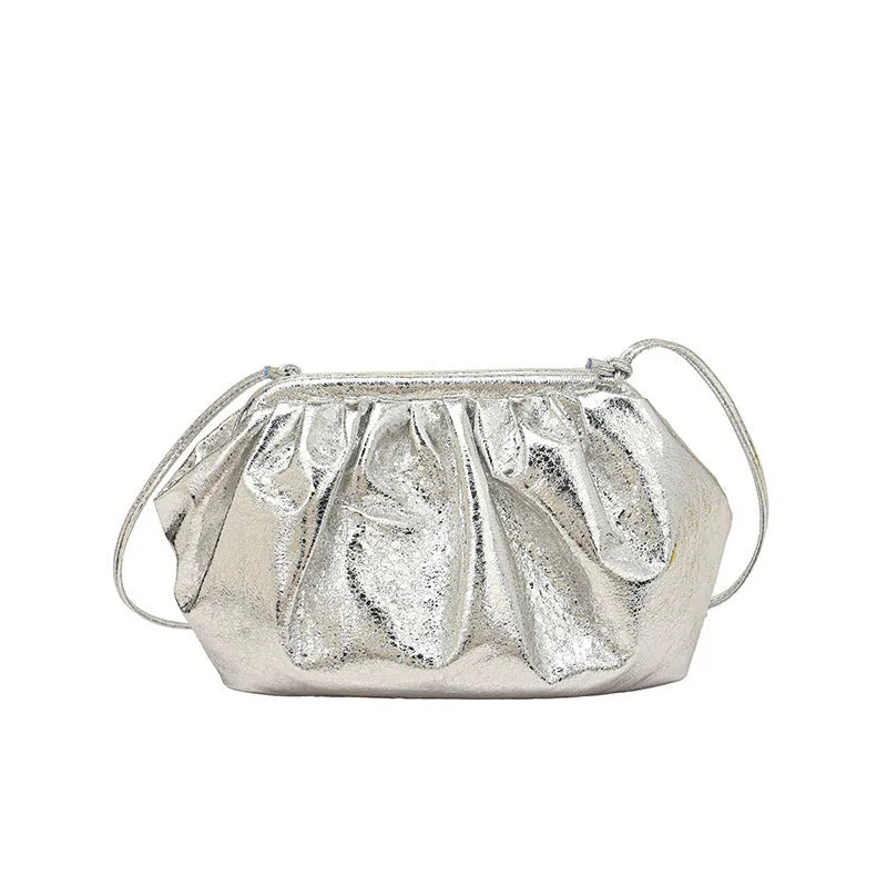 Simple Hair Clip crossbody bag in shell shape with adjustable strap, shown in rose red colour with visible sewing lines.