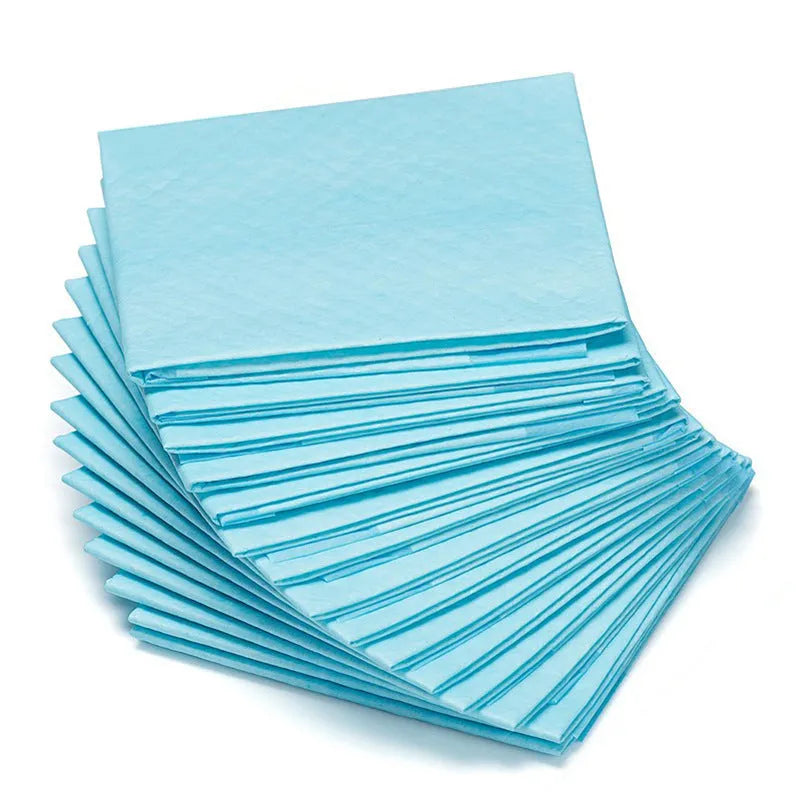 Pack of disposable pet urinal pads showing layered construction and size options S, M, L, XL for dogs and cats.