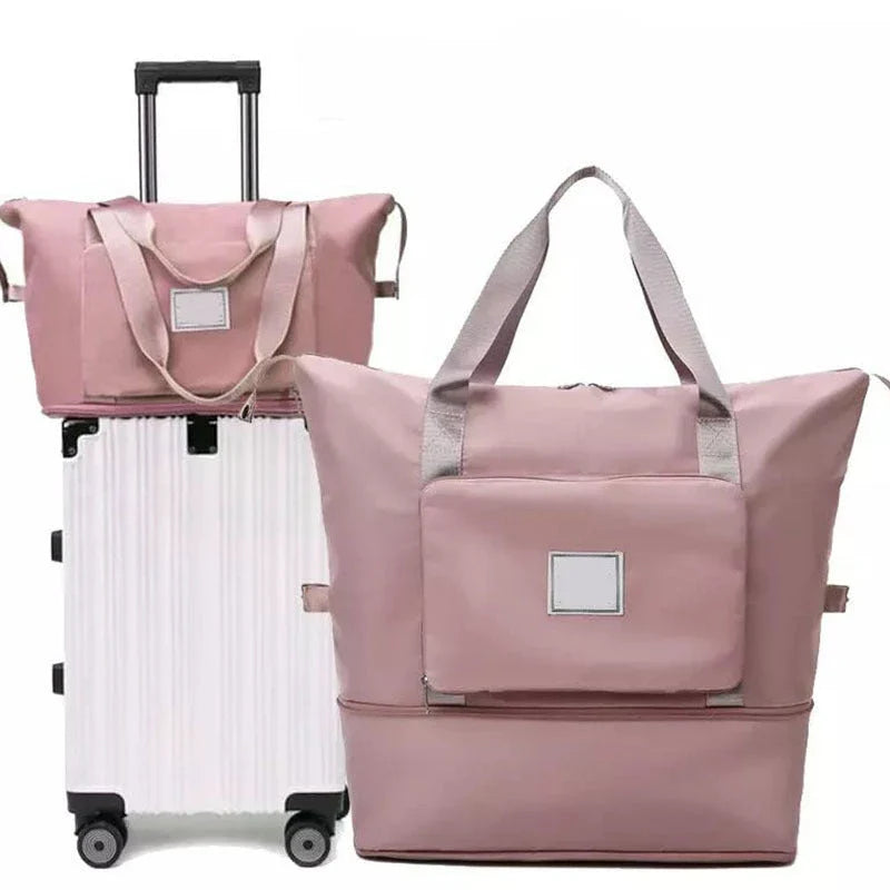 Stylish and spacious foldable travel bag for women, featuring a water-resistant Oxford cloth construction, multiple pockets, and convenient carrying options.