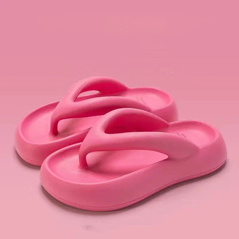 Solid colour thick-soled flip-flops with a bow on the strap, shown in multiple colour options.