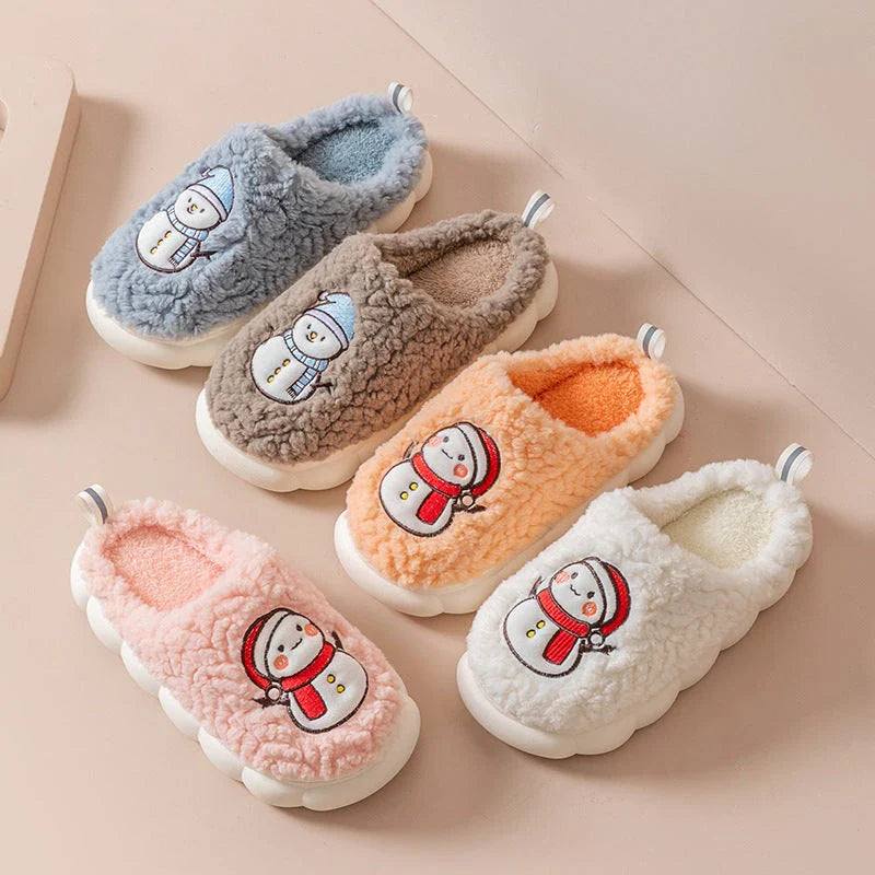 Cozy snowman-themed slippers with plush interior and thick, anti-slip soles for warm, comfortable indoor wear