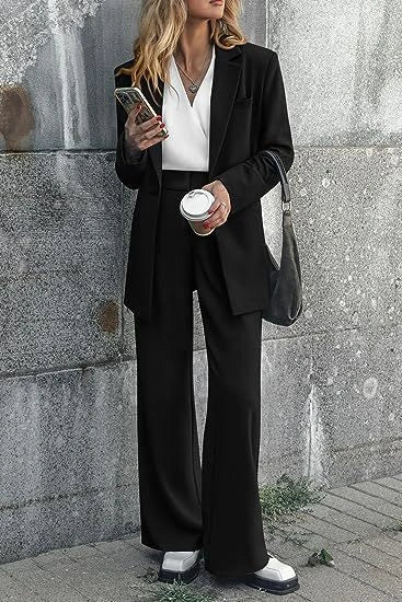 Tailored ladies' suit in various colours, featuring a jacket and trousers made of premium polyester fabric.