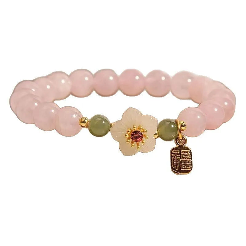 Crystal bracelet with Hetian jade elements and peach blossom design in blessing card colour