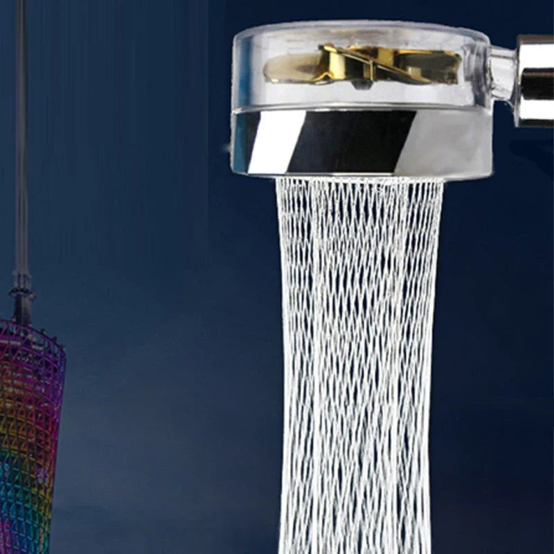 A high-pressure handheld shower head with a turbo-charged water flow and a cotton filter for a luxurious, spa-like bathing experience.