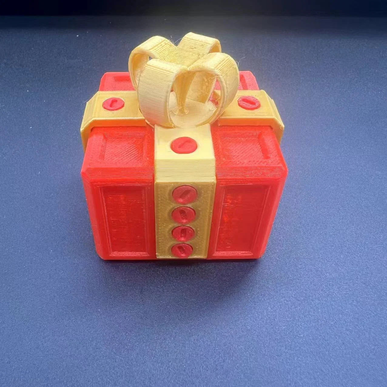 A unique 3D gift box with intricate details and a playful design, perfect for adding a touch of humor and personality to your gift-giving.