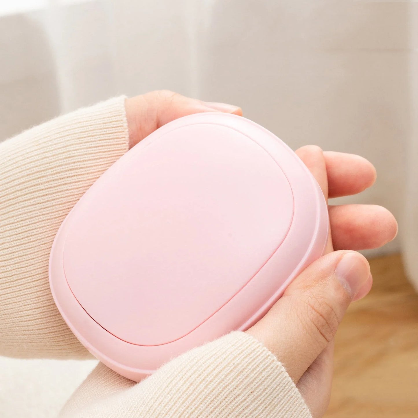 Cozy Portable USB Hand Warmer with Adjustable Heat Settings for Keeping Hands Warm in Cold Weather