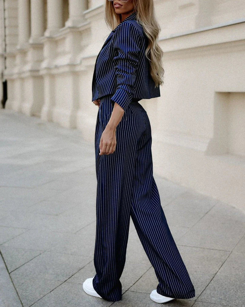 Stylish striped two-piece outfit featuring a cropped top and straight-leg pants in a variety of colors
