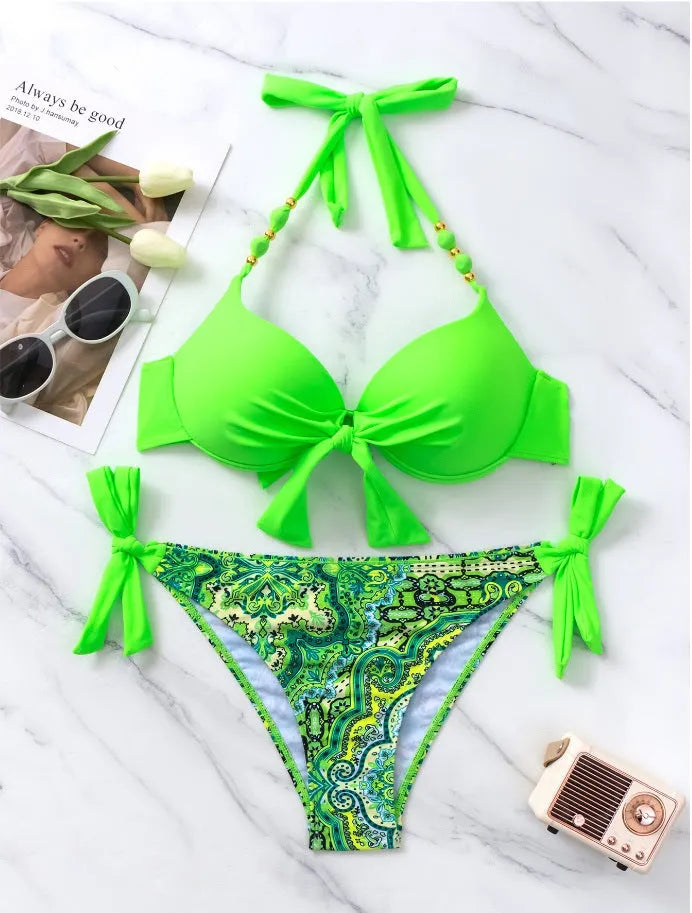 Ladies polyester bikini swimsuit set available in multiple colours including blue, red, and fluorescent green