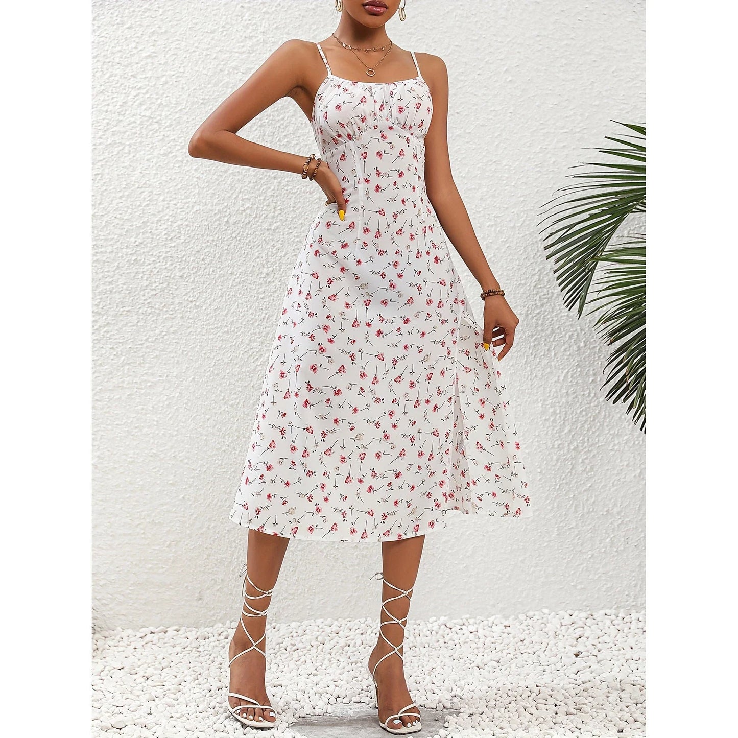 Elegant polka dot suspender dress with flattering side slit for women's summer fashion