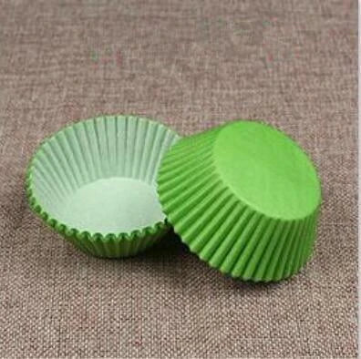 Colourful paper cupcake baking cups in a variety of vibrant shades, perfect for home baking and decorating
