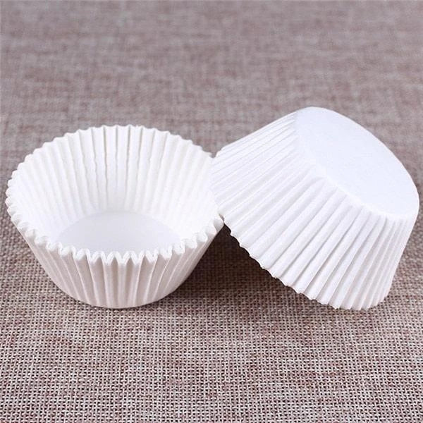 Colourful paper cupcake baking cups in a variety of vibrant shades, perfect for home baking and decorating