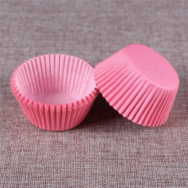 Colourful paper cupcake baking cups in a variety of vibrant shades, perfect for home baking and decorating