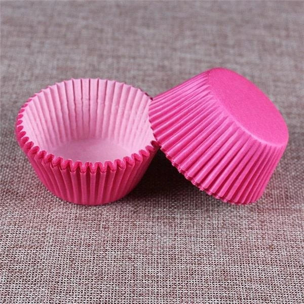 Colourful paper cupcake baking cups in a variety of vibrant shades, perfect for home baking and decorating