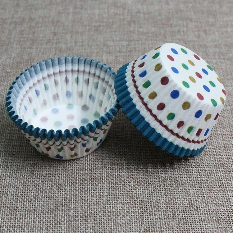 Colourful paper cupcake baking cups in a variety of vibrant shades, perfect for home baking and decorating