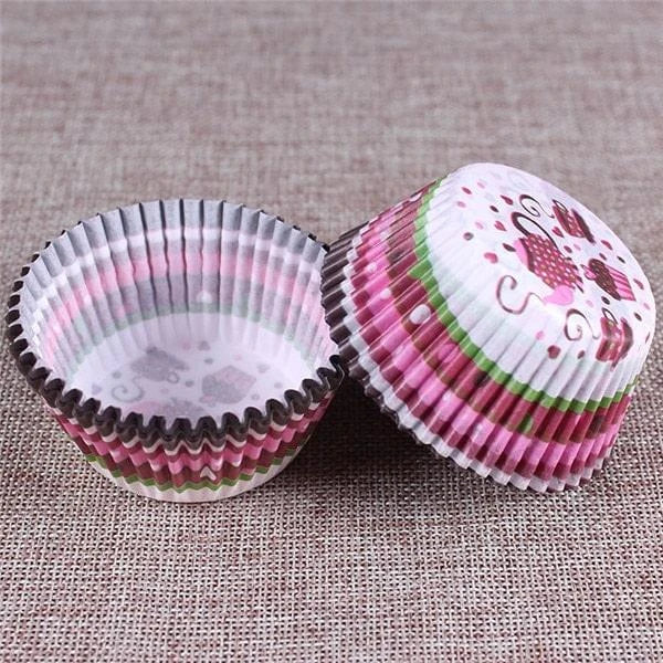Colourful paper cupcake baking cups in a variety of vibrant shades, perfect for home baking and decorating