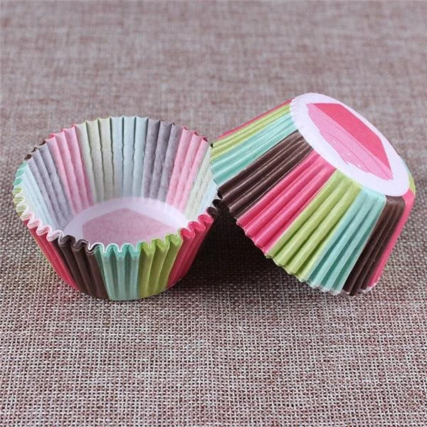 Colourful paper cupcake baking cups in a variety of vibrant shades, perfect for home baking and decorating