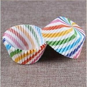 Colourful paper cupcake baking cups in a variety of vibrant shades, perfect for home baking and decorating