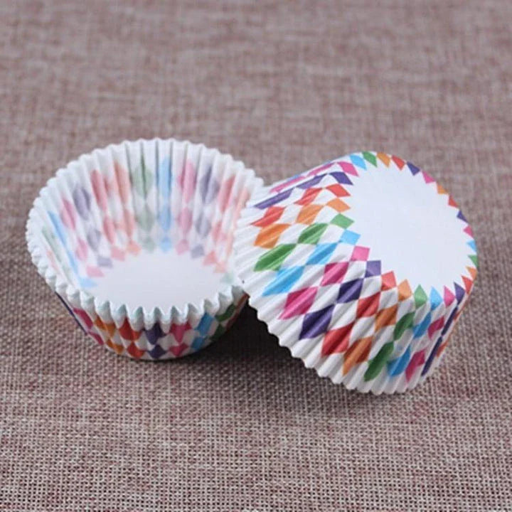 Colourful paper cupcake baking cups in a variety of vibrant shades, perfect for home baking and decorating