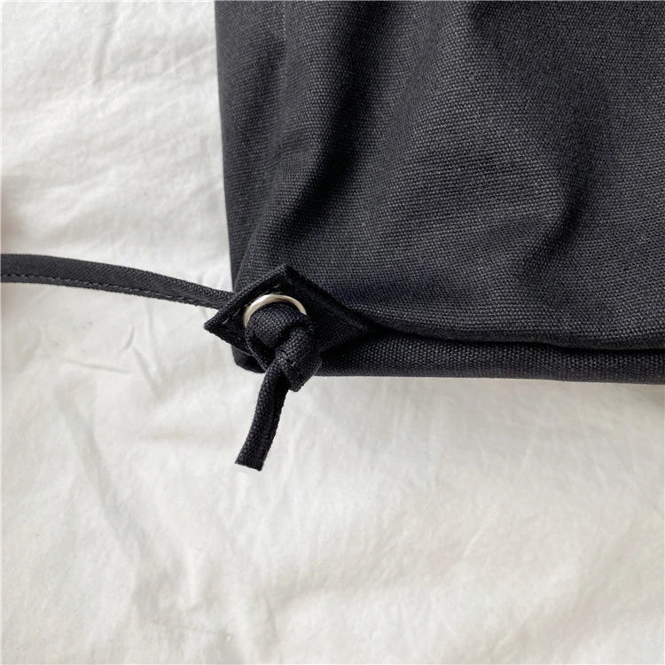 Creative drawstring bucket bag in white, black, brown, and zebra print patterns - a stylish and versatile women's tote bag made of high-quality polyester material