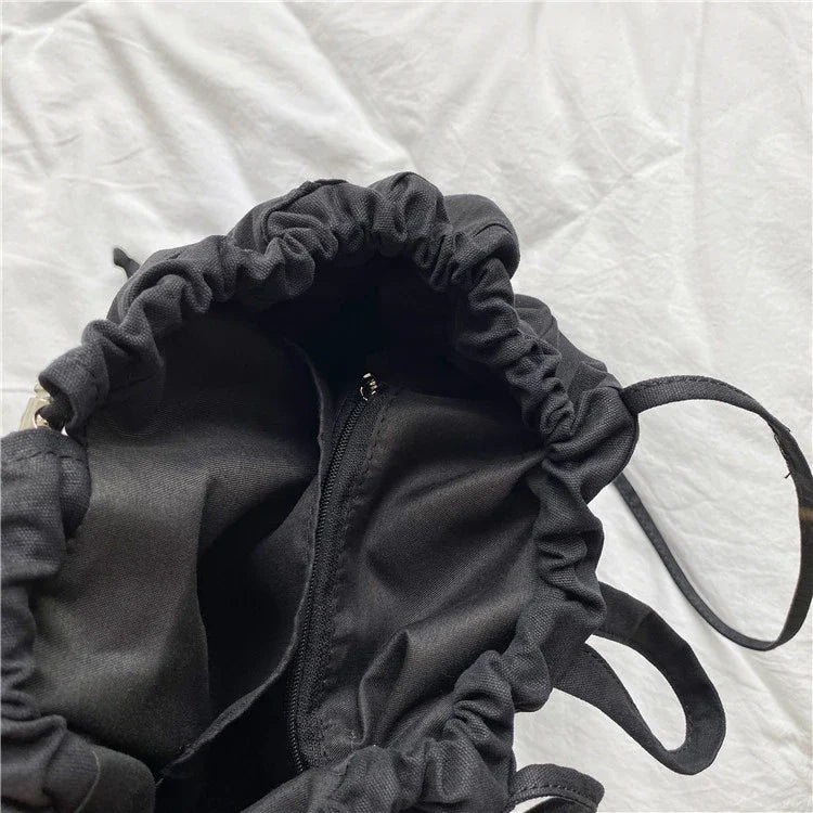 Creative drawstring bucket bag in white, black, brown, and zebra print patterns - a stylish and versatile women's tote bag made of high-quality polyester material