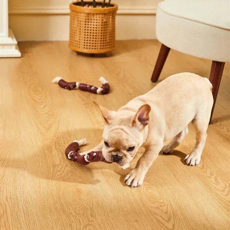 Durable cotton rope and vinyl sausage chew toy for dogs, designed to entertain and promote dental hygiene.