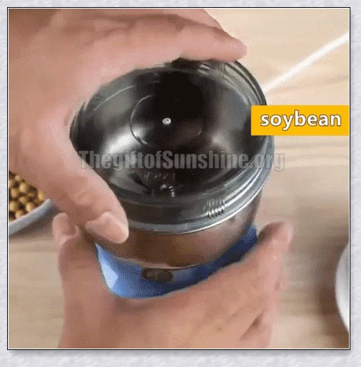 A sleek and modern multifunctional smash machine made of premium stainless steel for effortless grinding and versatile culinary applications.