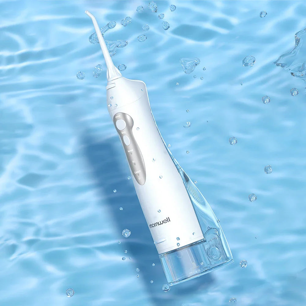 A stylish, rechargeable water flosser with four interchangeable nozzles for a personalised and thorough dental cleaning experience.