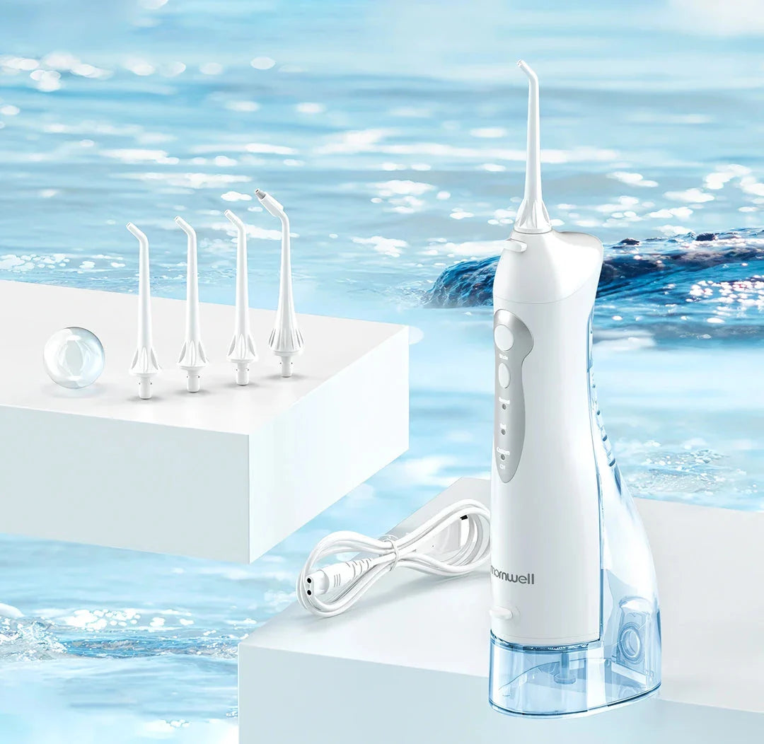 A stylish, rechargeable water flosser with four interchangeable nozzles for a personalised and thorough dental cleaning experience.