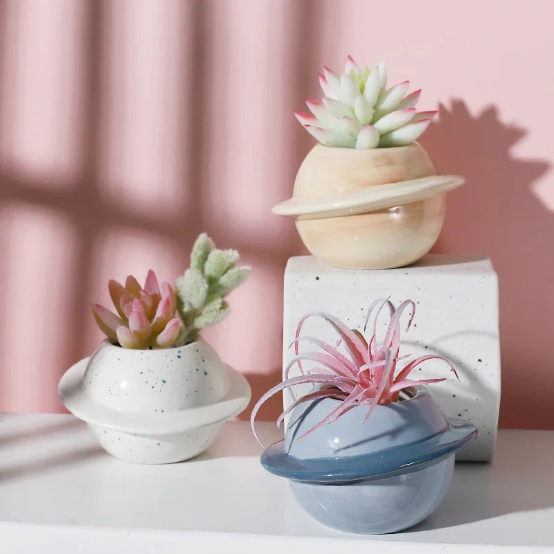 Mini Planet Shape Ceramic Succulent Flower Pot with a smooth, planet-inspired design in blue colour