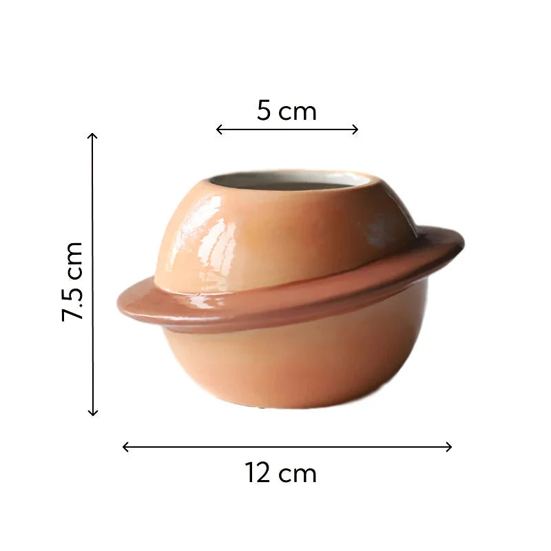 Mini Planet Shape Ceramic Succulent Flower Pot with a smooth, planet-inspired design in blue colour