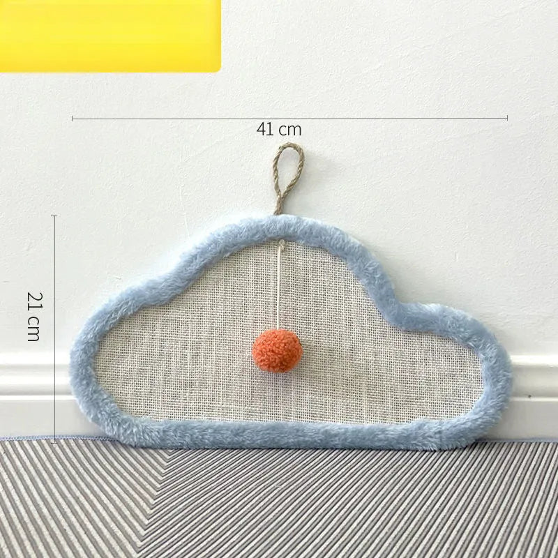 White natural sisal cat scratching mat with sleeping cat cartoon design, mounted on a wall.