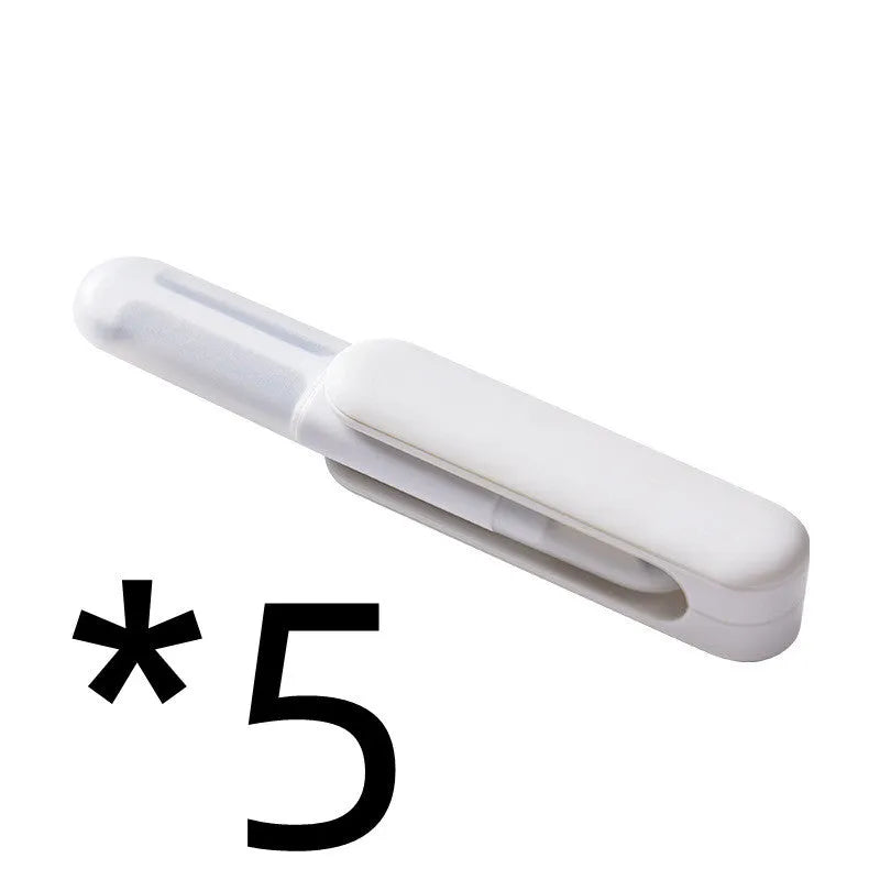 White multifunctional rotary kitchen peeler with stainless steel blade and ergonomic PP handle.