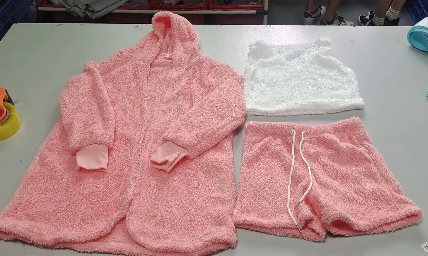 A cozy 3-piece loungewear set featuring a long sleeve crop top and drawstring shorts in a variety of stylish colors.