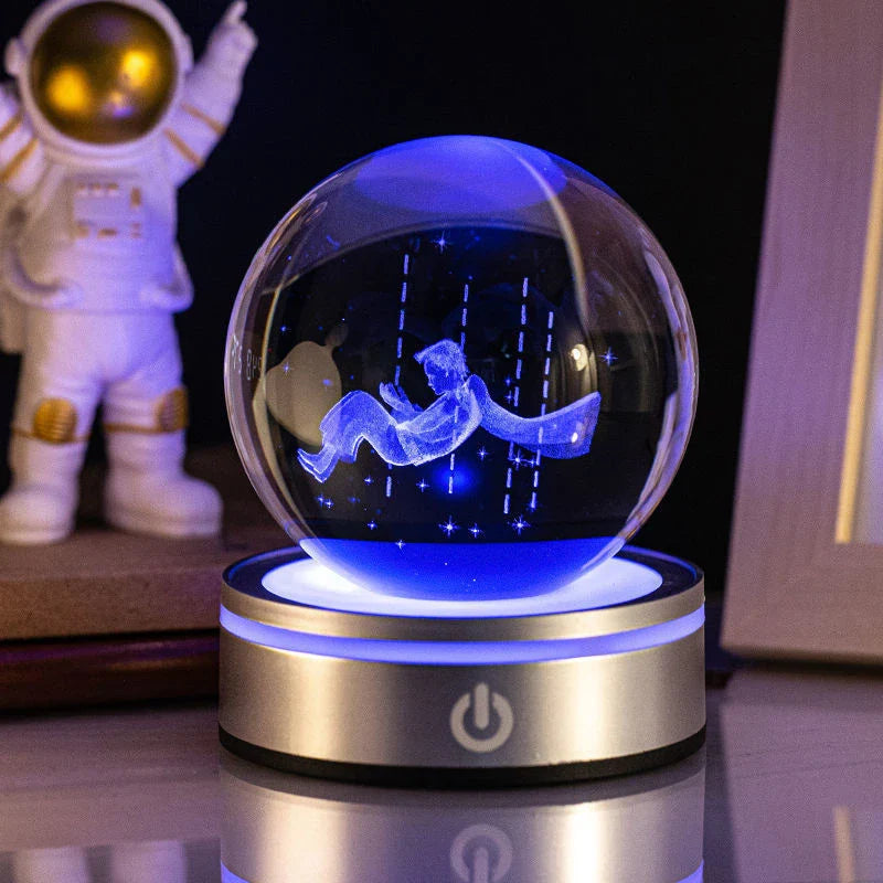 Luminous crystal ball with various celestial-inspired designs, including the Milky Way, Solar System, and Constellation.