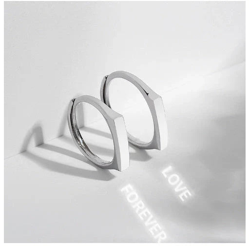 Elegant S925 sterling silver rings with a hidden love pattern design, adjustable sizing for a personalized fit.