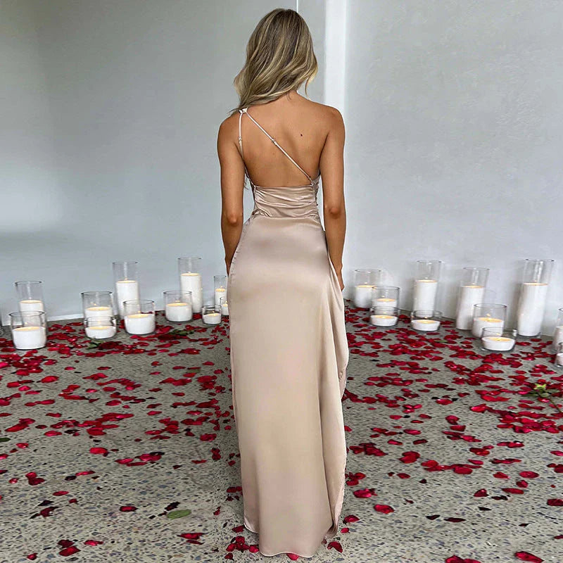 Chic one-shoulder backless slit dress in various colors, including red, apricot, rust, royal, wine red, and more.