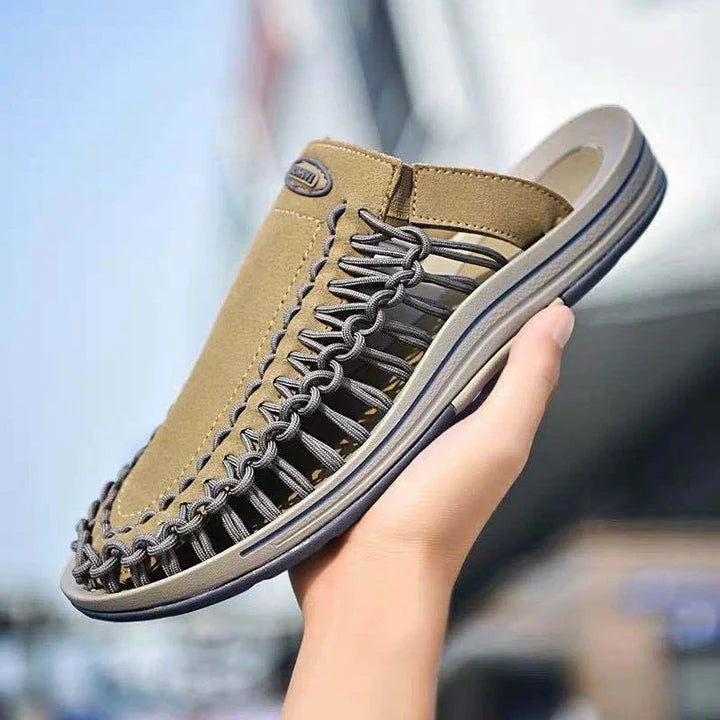 Fashionable men's woven sandals and slippers in blue and black colours, featuring a sophisticated design and durable rubber sole for comfort.