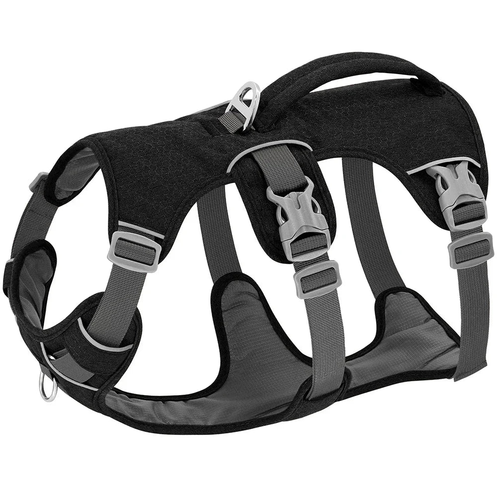 Reflective nylon dog harness with handle for small, medium, and large dogs, featuring adjustable straps and durable construction for comfortable, controlled walks.