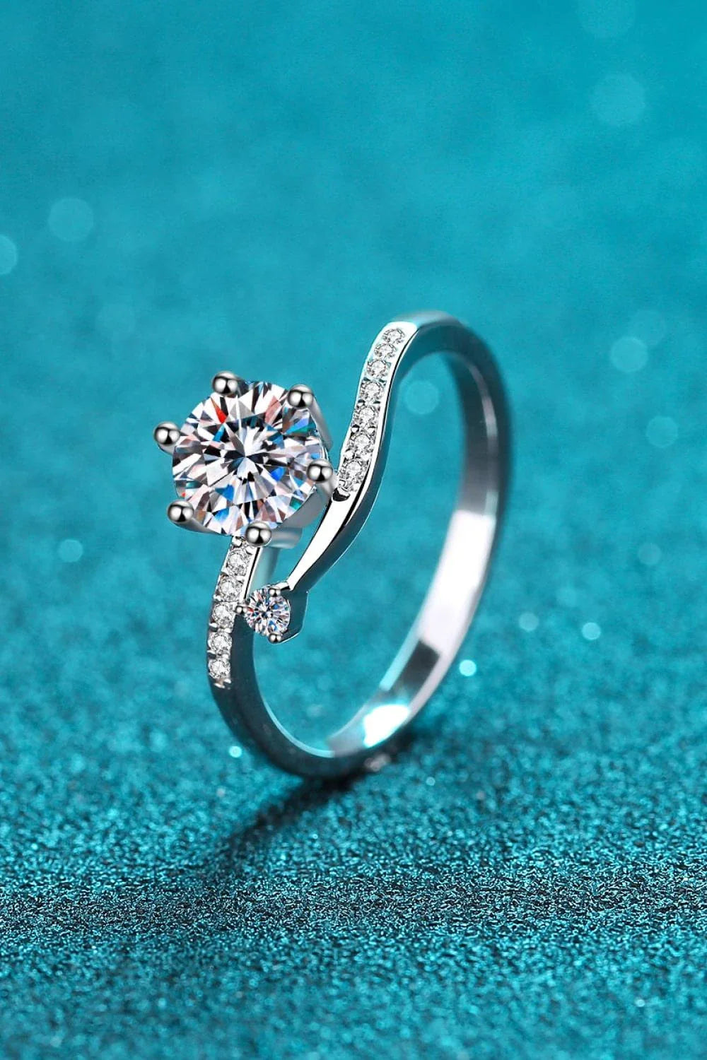 Elegant 925 sterling silver moissanite ring with sparkling centre stone and zircon accents