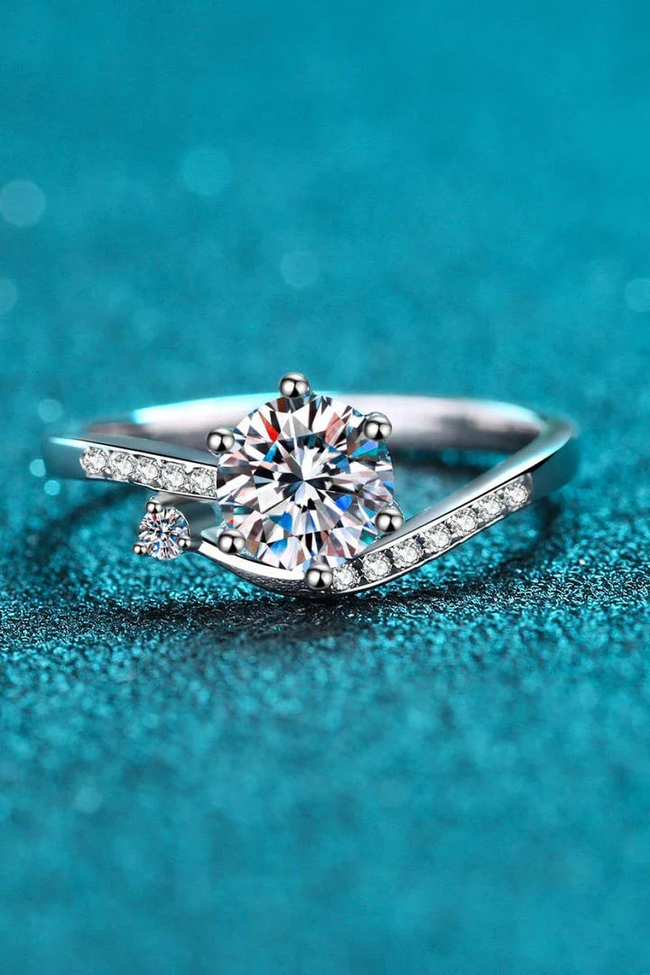 Elegant 925 sterling silver moissanite ring with sparkling centre stone and zircon accents