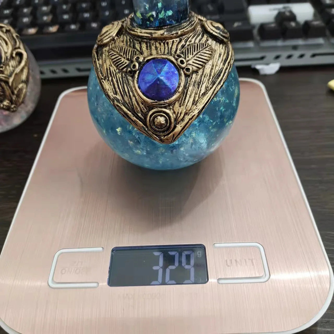 Shimmering resin ornament featuring a mesmerising mermaid design and glowing crescent moon