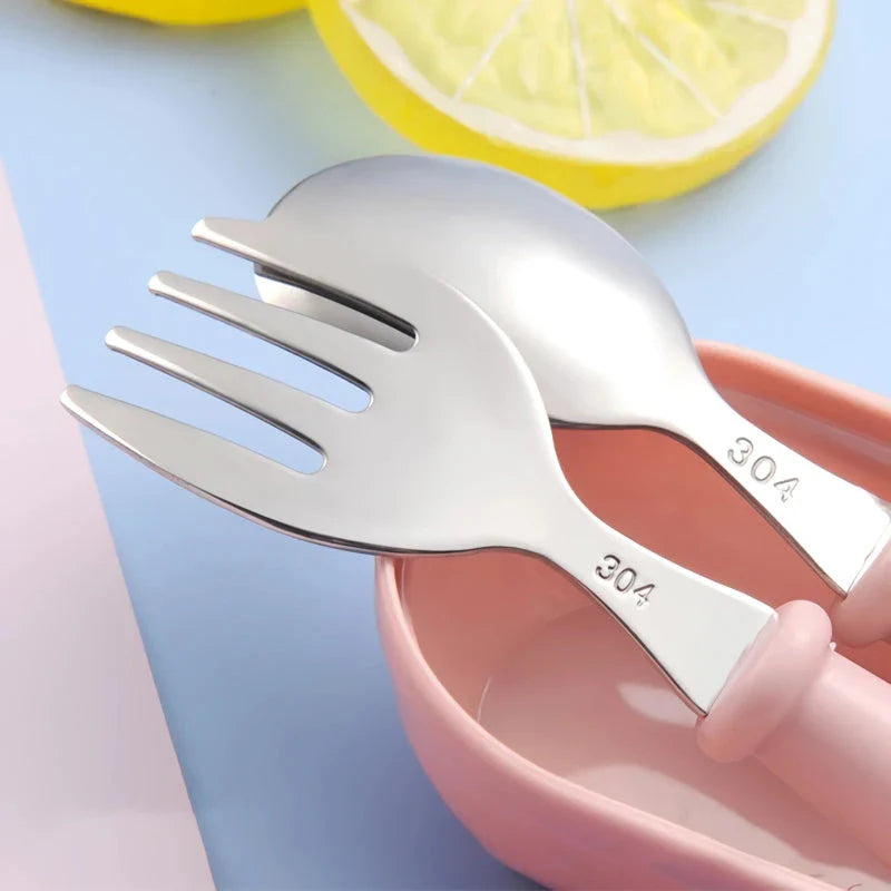 Charming cartoon stainless steel toddler cutlery set with engaging designs and ergonomic shape for easy grip
