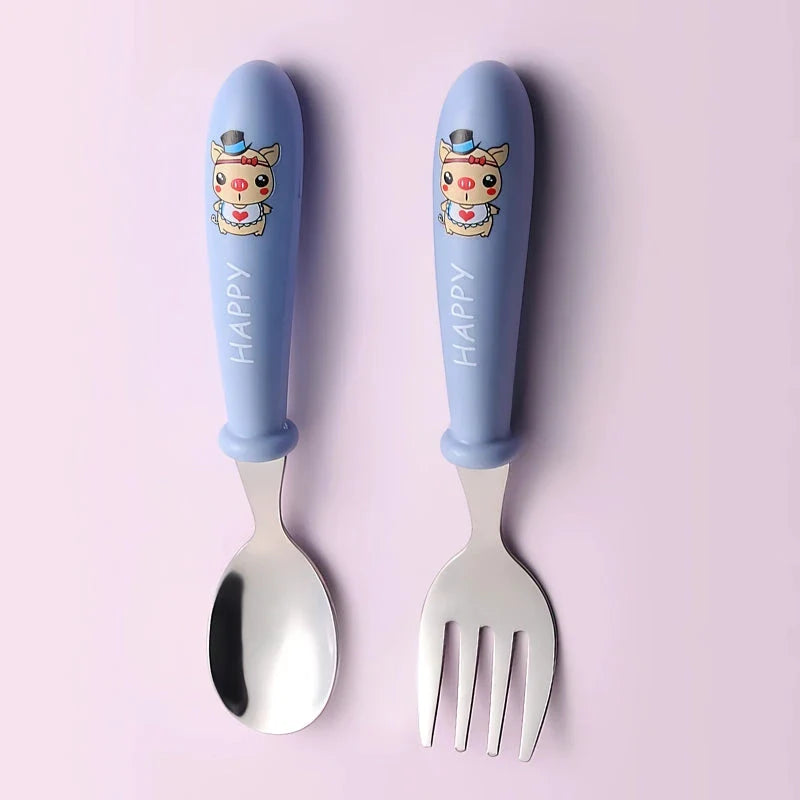 Charming cartoon stainless steel toddler cutlery set with engaging designs and ergonomic shape for easy grip