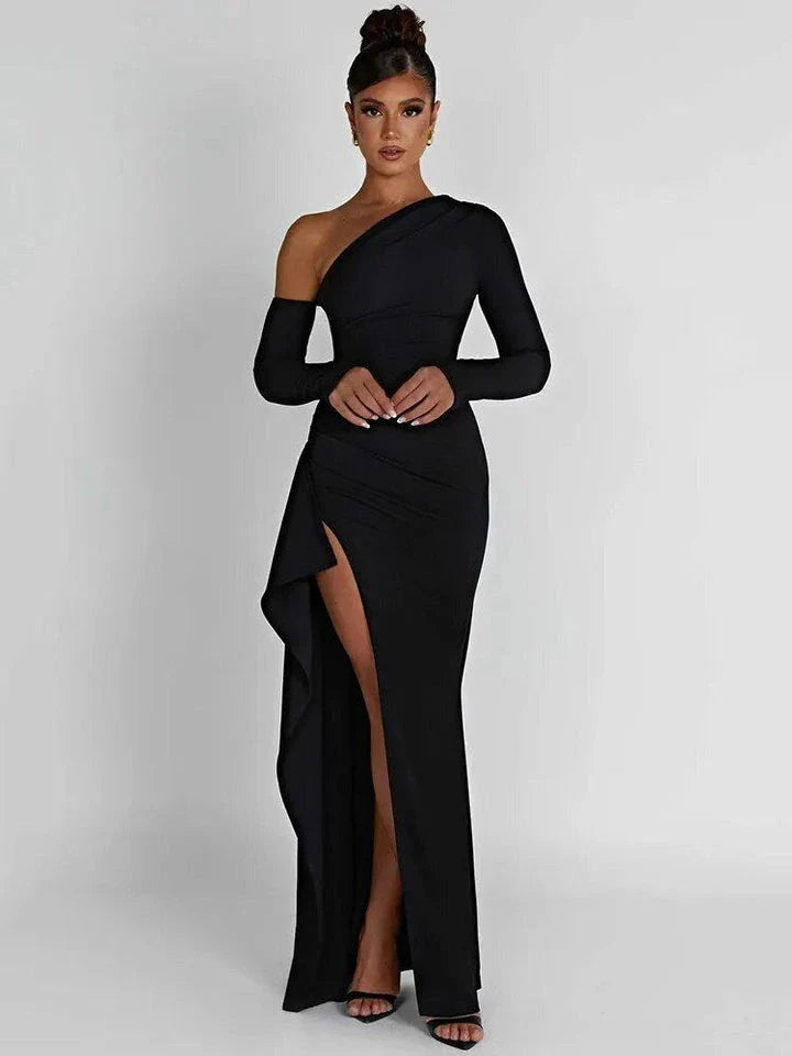 Elegant wine red maxi dress with oblique shoulder design, thigh-high split, and backless feature for sophisticated evening wear